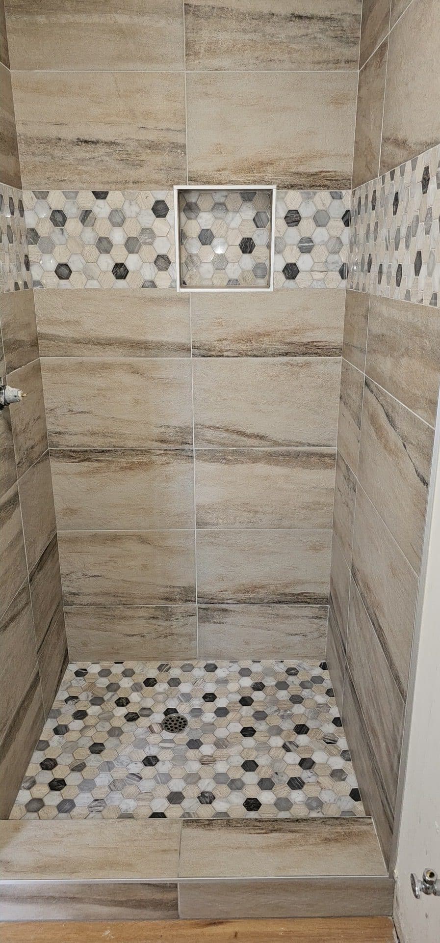 Completed tiled shower